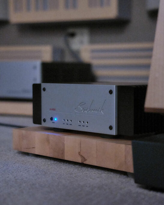 benchmark ahb2 with wooden stands and visible brand logo on a blurred background