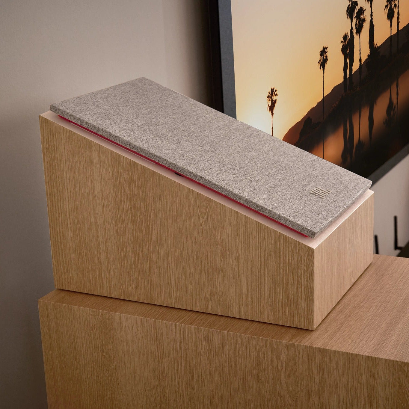 JBL Stage2 240H Surround Sound Loudspeaker placed in table in a room with a TV.